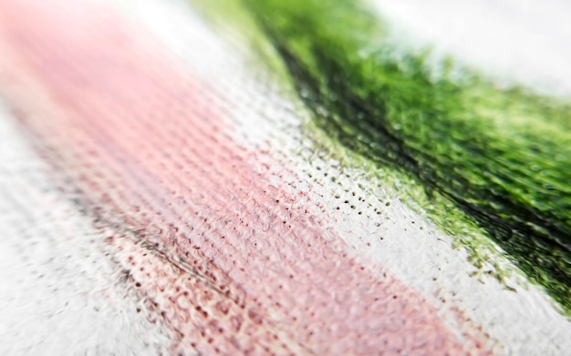 Haft na białym płótnie z kolorowymi nićmi